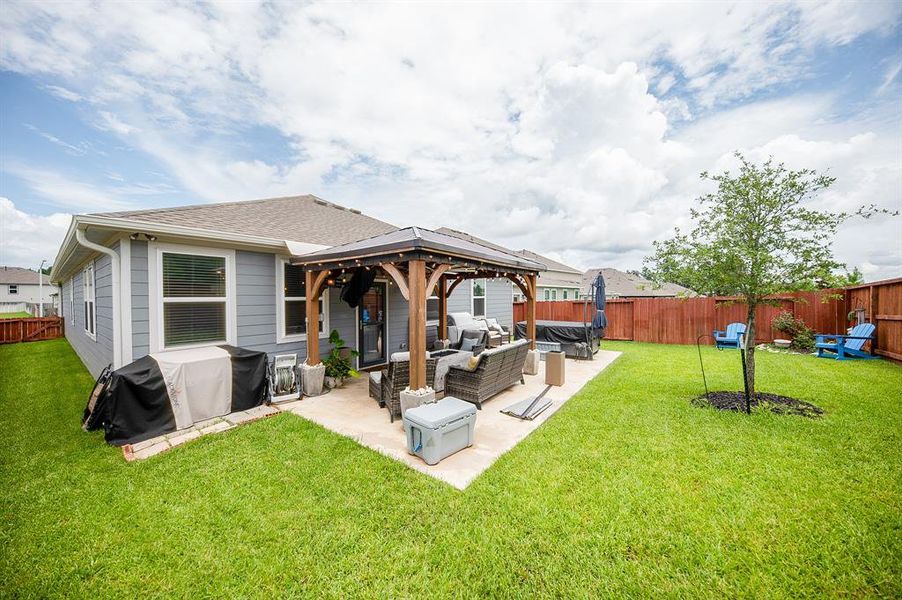 This view of the back yard shows you how much yard you really have!  Plenty of room for the kids or pets to run & play.