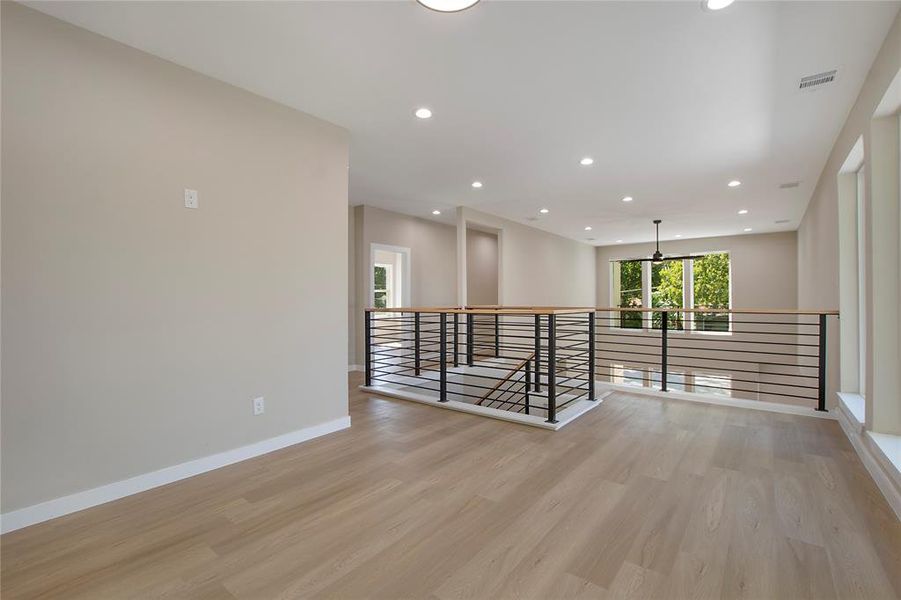 Spare room featuring light hardwood / wood-style flooring