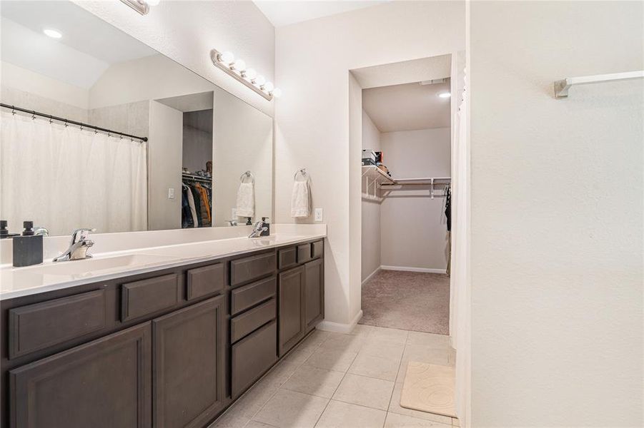 Primary bathroom with walk-in closet