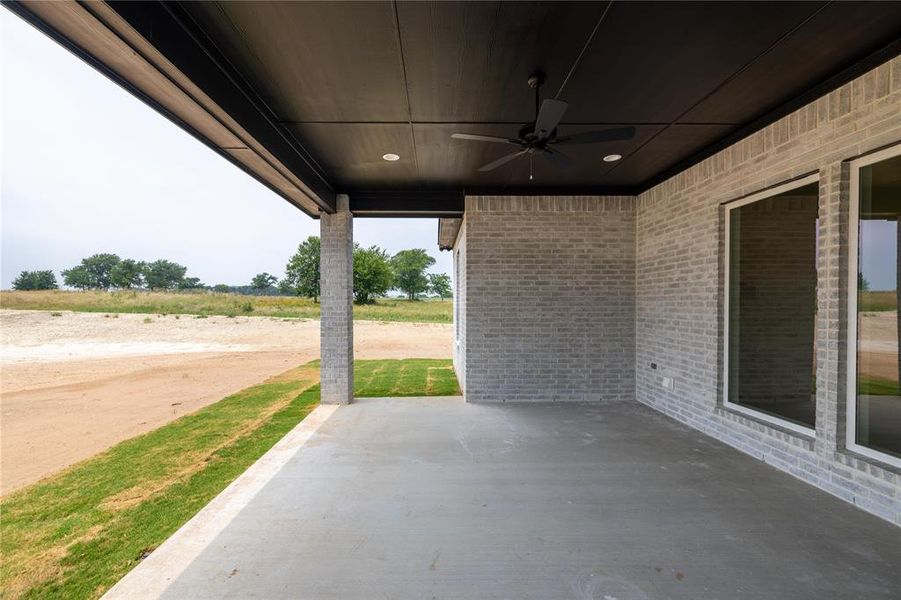 View of patio with ceiling fan