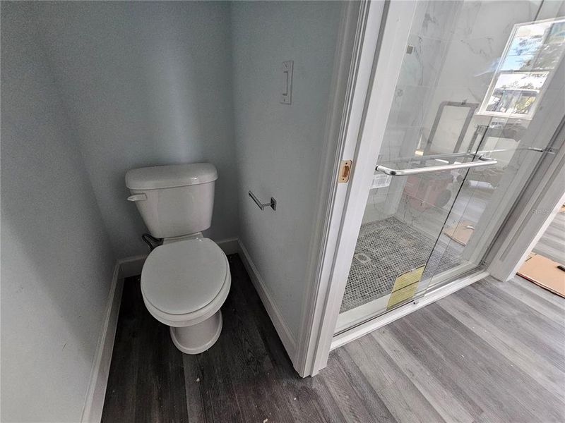 Primary Suite Bathroom with Water Closet