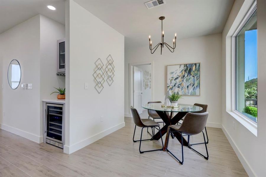 VIEW INTO DINING AREA AND TWO GUEST BEDROOMS ON THIS SIDE OF THE CONDO.