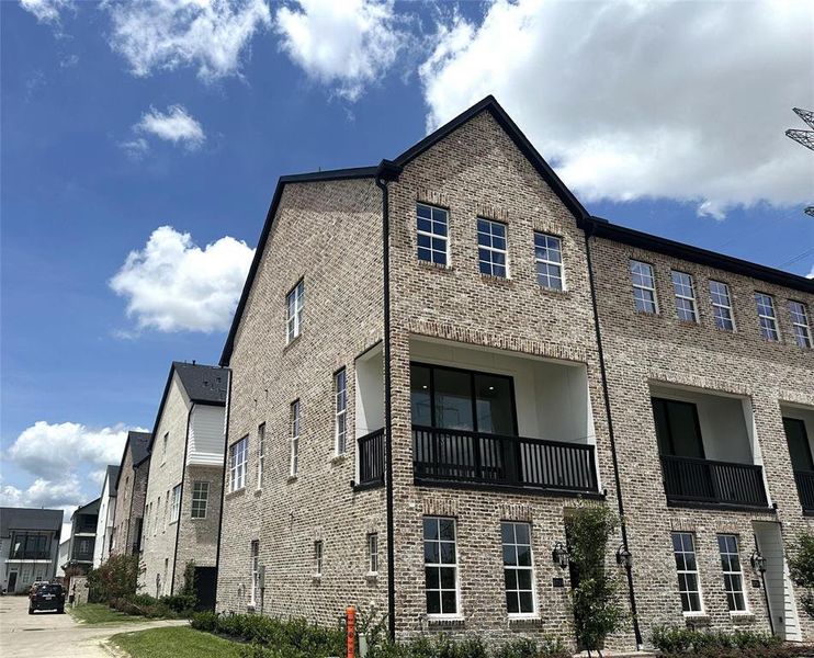 Great Natural Light for this Corner Antique Brick TownHome