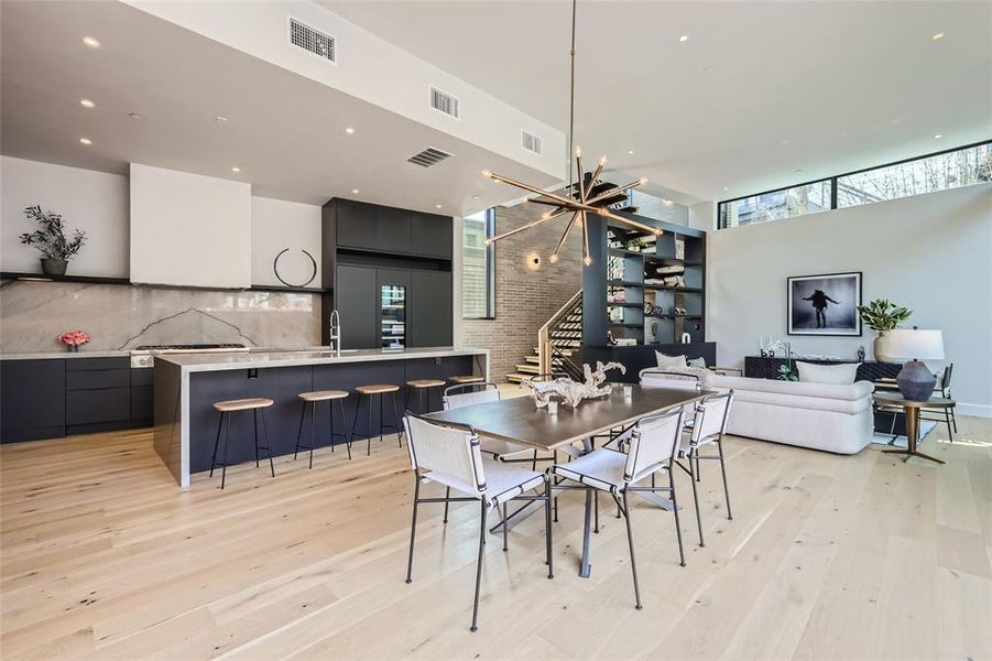 Dining Room opens up to side yard with 15 ft Glass Sliding Door Opening