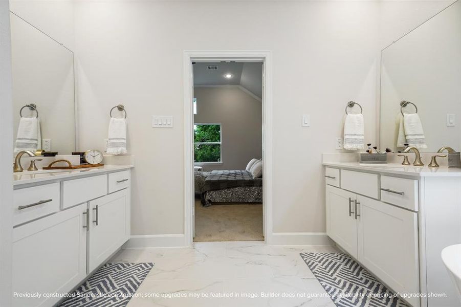 Dual vanities make busy mornings a breeze, ensuring everyone has their own space to get ready.