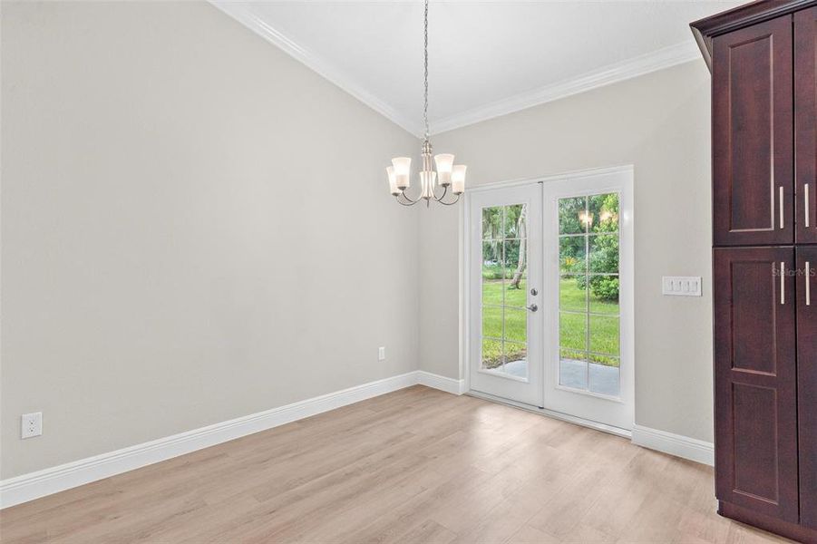 Dining Area with French Doors leading to Patio Area