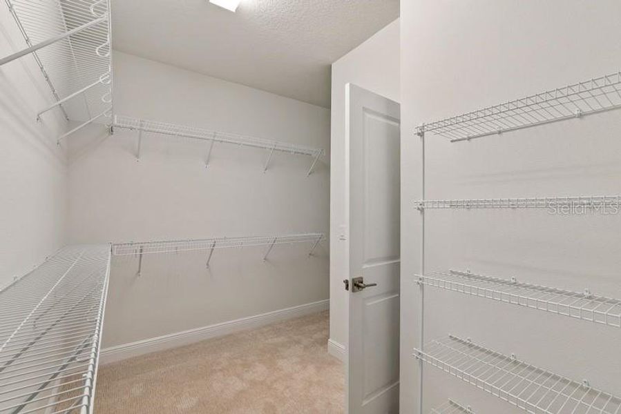Owner's Closet **Photos are of a Similar Home
