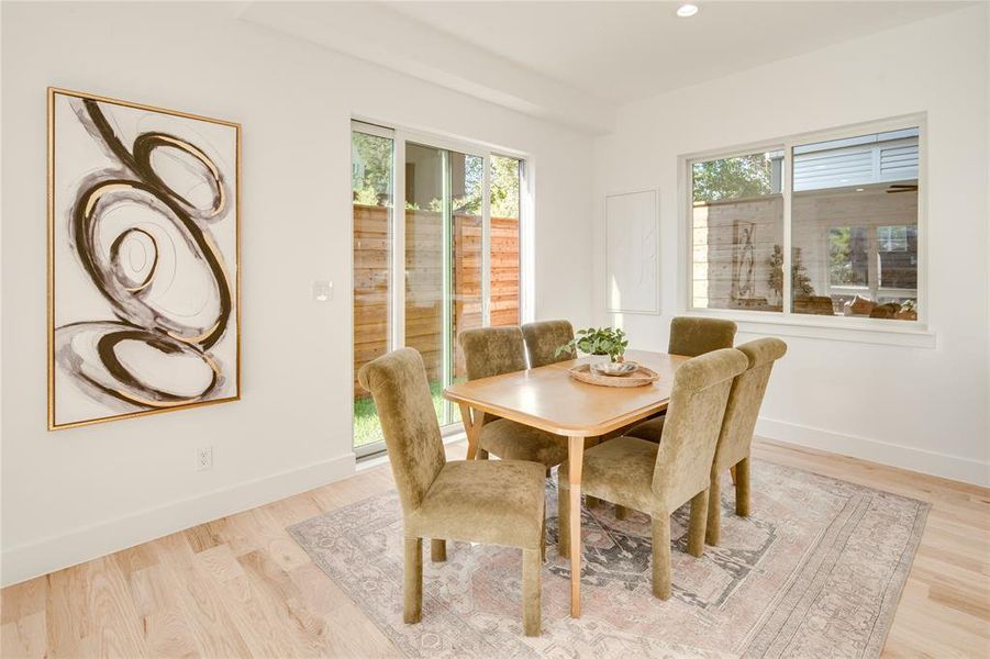 Dining room with light wood-type flooring