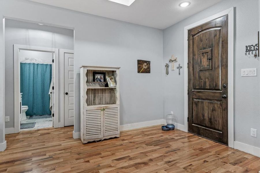 Entryway featuring  wood flooring