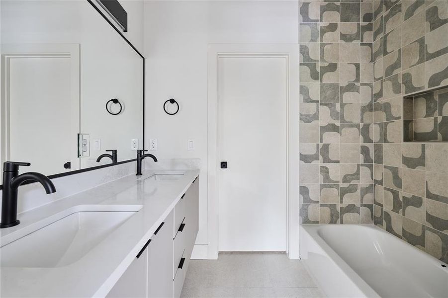 secondary bathroom with dual vanities