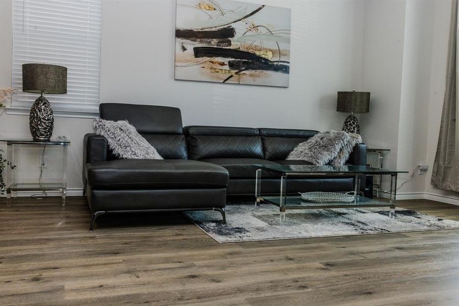 Living room featuring dark hardwood / wood-style floors