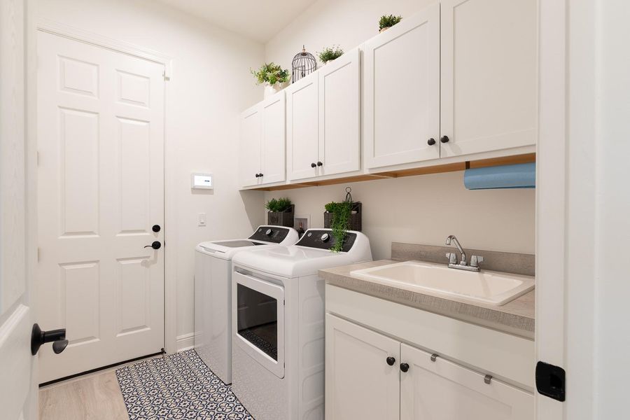 Laundry Room with Sink and Cabinets