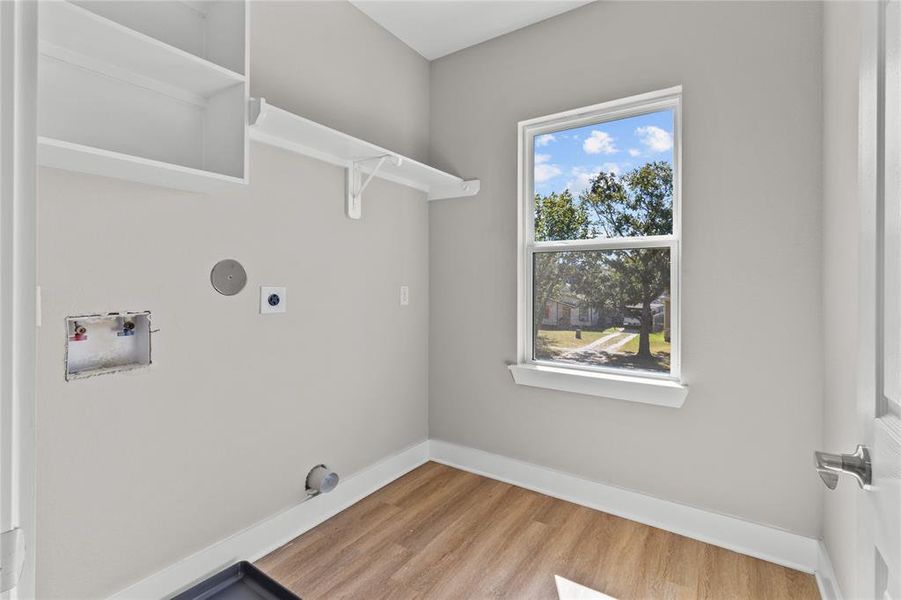 Conveniently located on the second floor, the utility room makes laundry day a breeze.