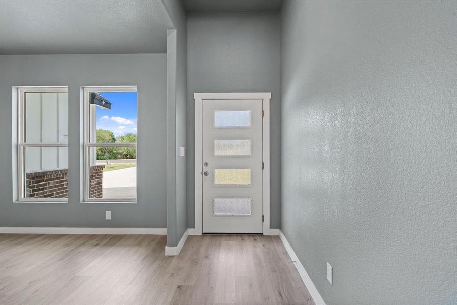 Doorway featuring light hardwood / wood-style flooring