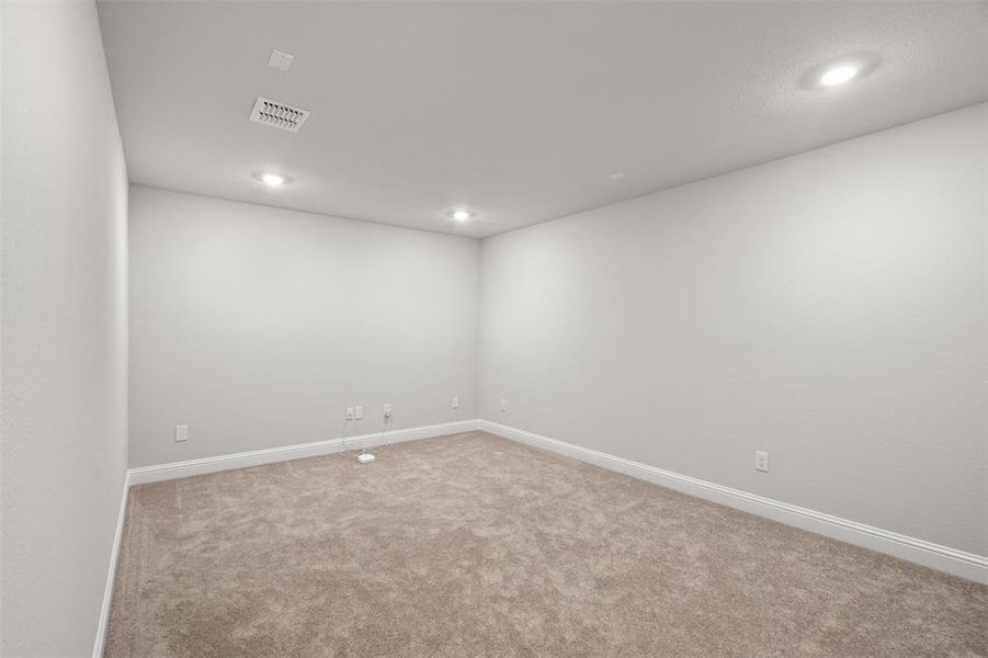 Empty room featuring carpet floors