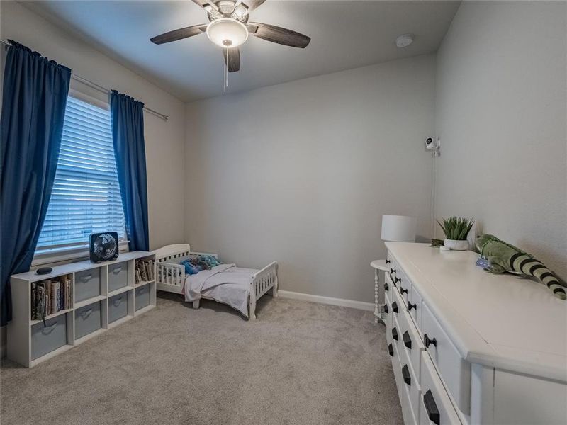 bedroom 4 lots of light and ceiling fan