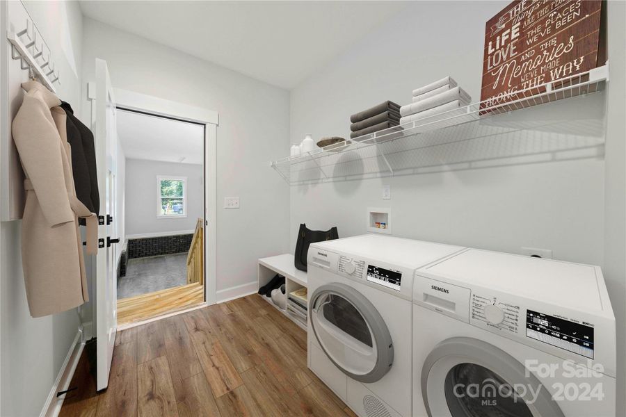 Laundry room is spacious.