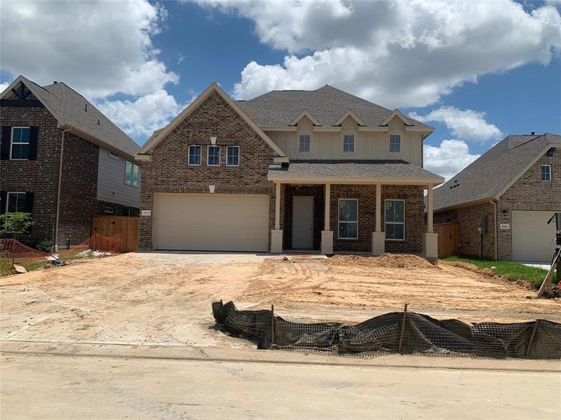 Two-story home with 4 beds, 3.5 baths and 2 car garage