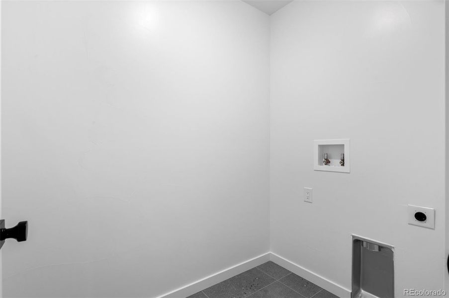 Laundry room is conveniently located on 2nd floor