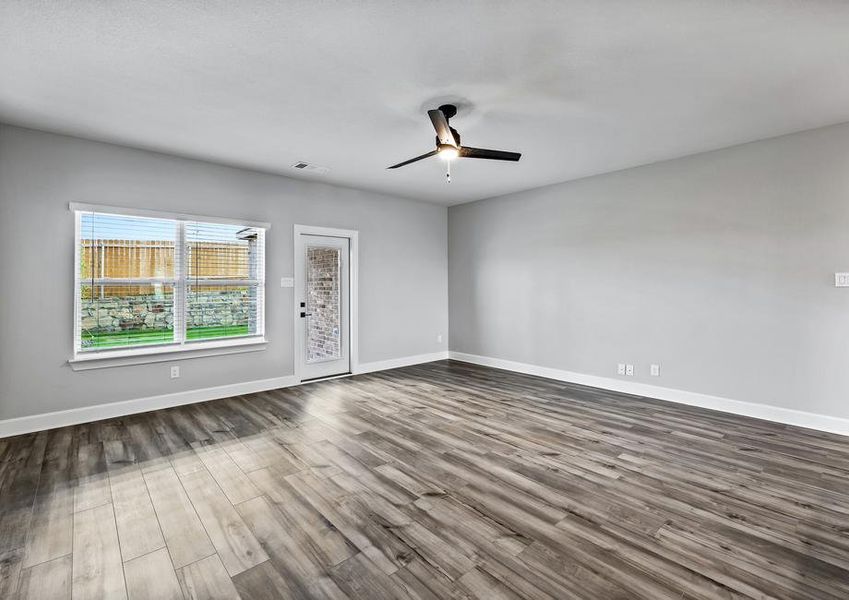 The family room of the Michigan floor plan has great windows that provide great natural light.