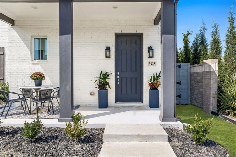 Doorway to property featuring a porch