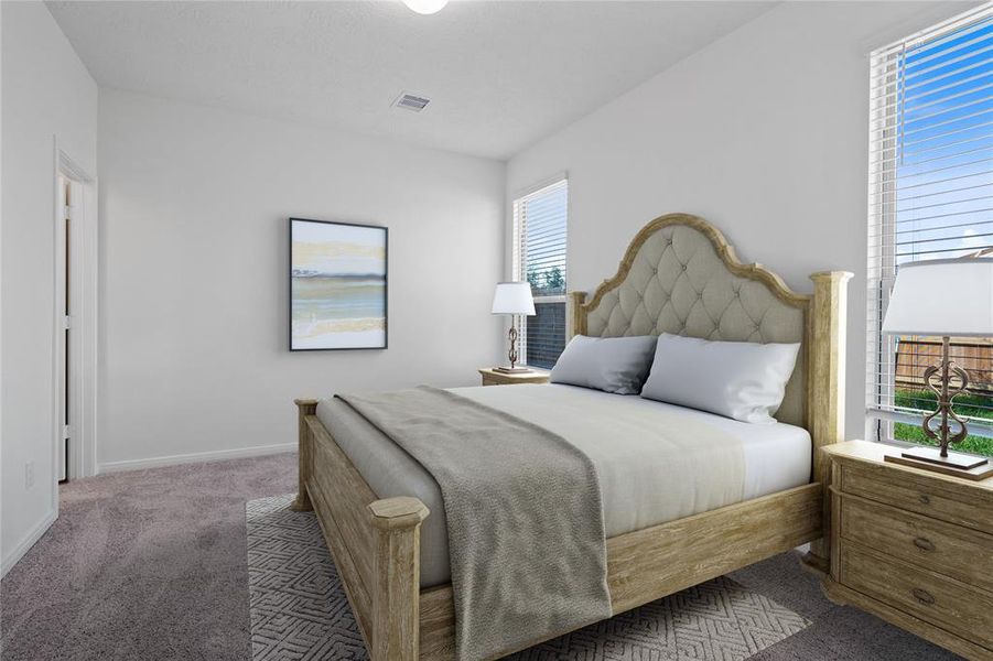 Come and unwind after a long day in this magnificent primary suite! This spacious room features plush carpet, warm paint, high ceilings and large windows with privacy blinds.