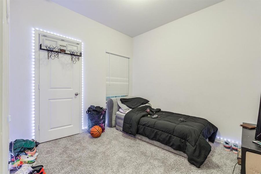 Bedroom with carpet