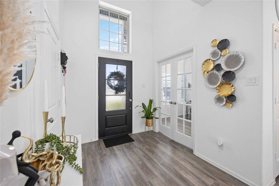 Entry foyer with view of office at front of home