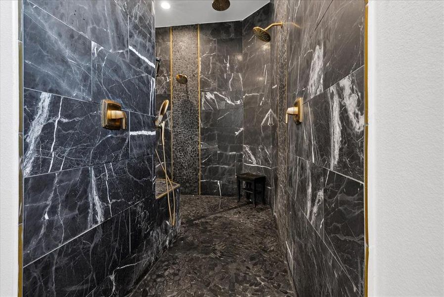 Bathroom featuring tiled shower