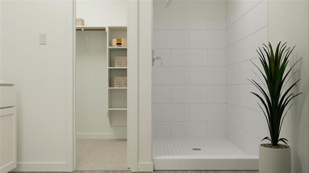 Bathroom with tiled shower