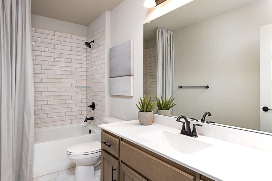 Bathroom 2 | Concept 3135 at Belle Meadows in Cleburne, TX by Landsea Homes
