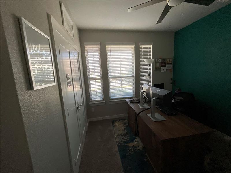 Office area featuring ceiling fan