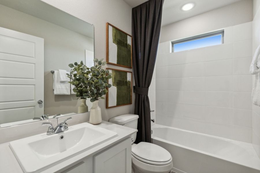 Bathroom in the Willow home plan by Trophy Signature Homes – REPRESENTATIVE PHOTO
