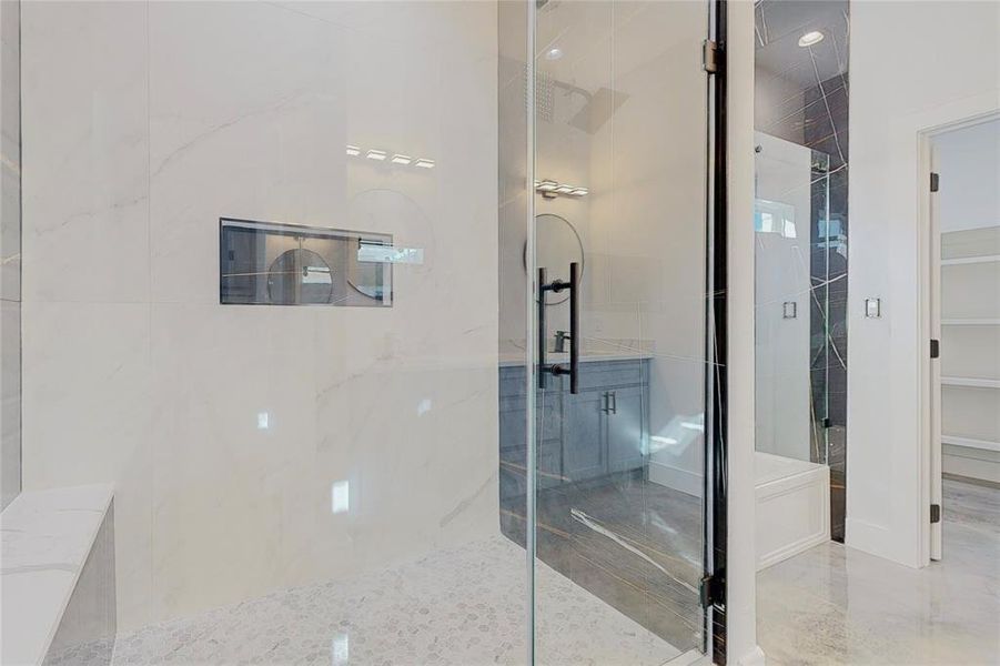 Bathroom featuring separate shower and tub and tile patterned flooring