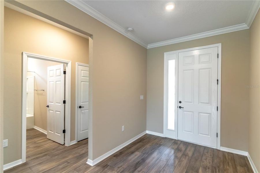 Hall leading to 2nd & 3rd bedrooms and 2nd bath.