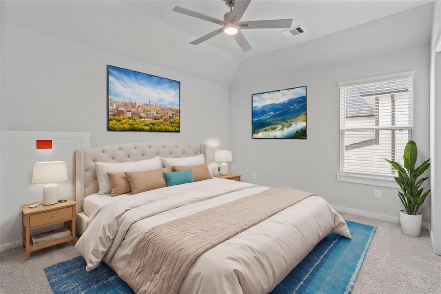 Secondary bedroom features plush carpet, custom paint, ceiling fan with lighting and a large window with privacy blinds.