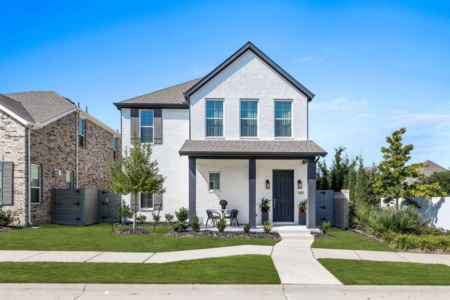 View of front of house with a front lawn