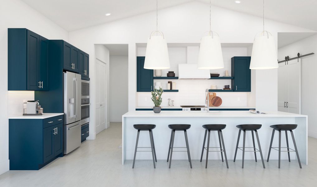 Kitchen with pendant lights and stainless steel appliances