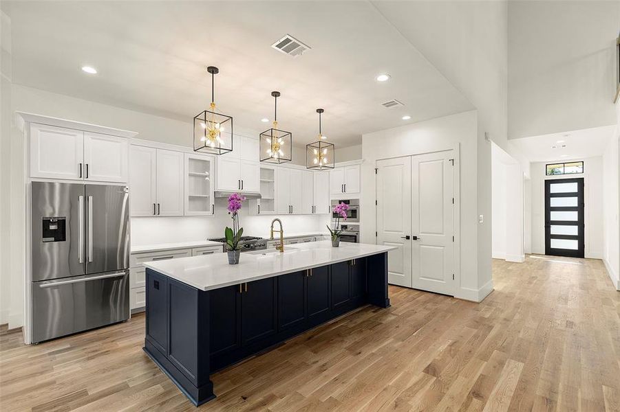 view 3 of the generous counter and prep areas, tasteful modern styling is thruout this beautiful home