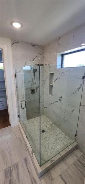 Bathroom featuring an enclosed shower