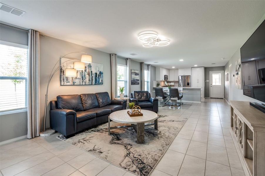 Another view of the living area. The windows on this side of the home overlook the expansive sideyard.