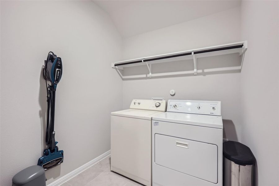 Enjoy your large laundry room that has enough space for a full-sized washer and dryer, plus storage for other items.