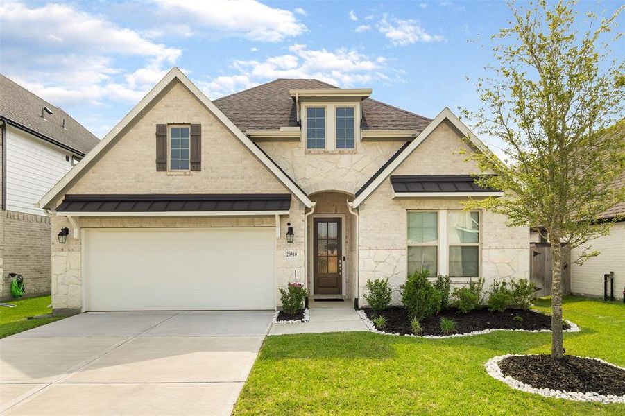 Welcome to 20310 Rose Gray Lane, in the distinguished Amira community!