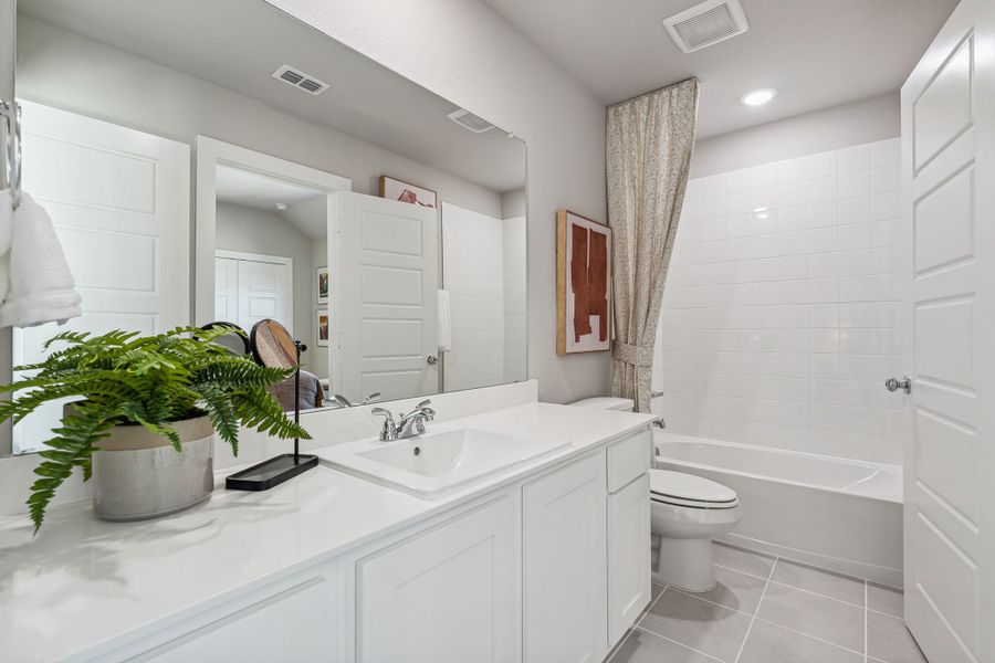 Bathroom in the Willow home plan by Trophy Signature Homes