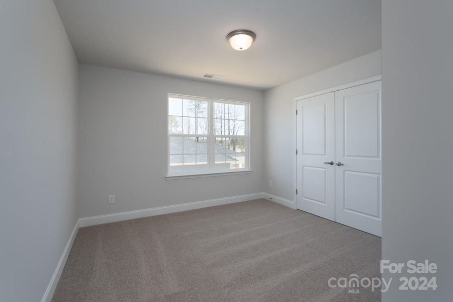 Upstairs Bedroom. Photo representation. Colors and options will differ.