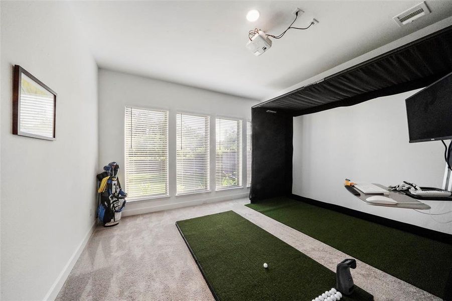 Large game room which Seller uses to practice his golf swing!