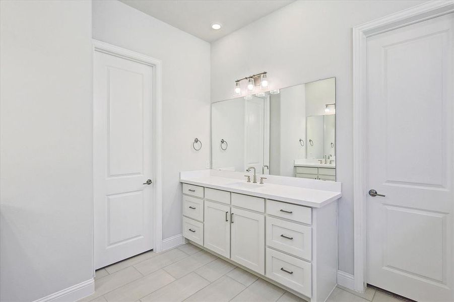 Bathroom featuring vanity