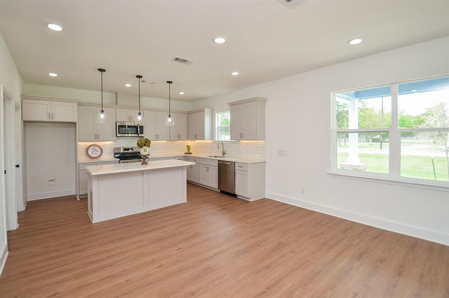 Large Kitchen Island with plenty of counter and cabinet space