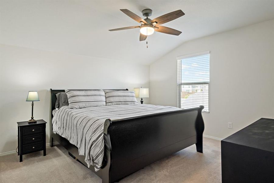 One of 4 bedrooms, this one is located upstairs and offers a large closet and ceiling fan.