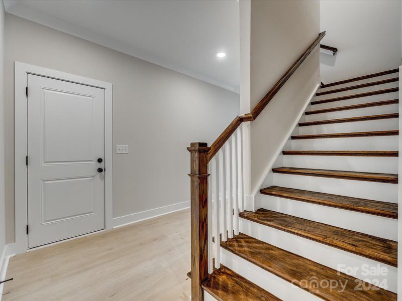 Informal staircase to huge bonus room with full bath or 4th BR